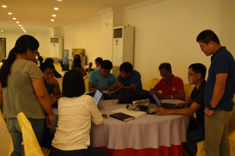 Participants accomplishing one of the guided workshop activities of WE VALUE.