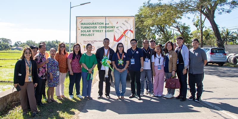 LGU officials, Vice Gov. Vaquilar, and DILG personnel pose for a group photo after the ceremonial ribbon cutting.
