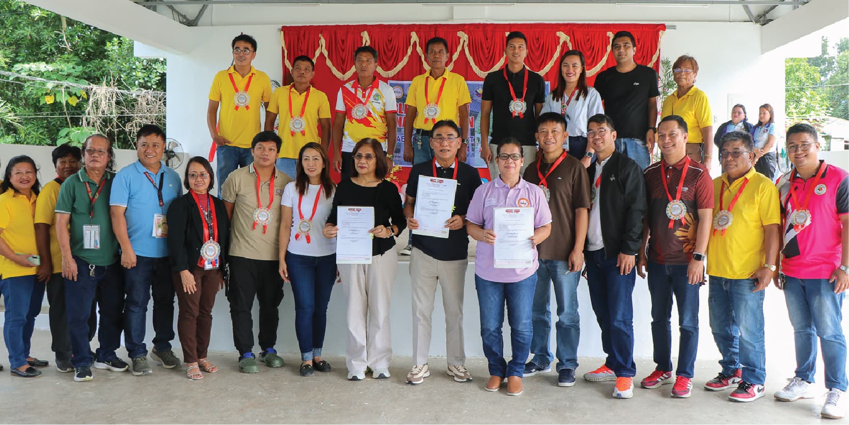 RD De Leon, PD Toribio, and Mayor Pua are accompanied by CH Rosales, MLGOO Valdez, Sangguniang Bayan Members, functionaries, and Brgy. San Antonio officials as they display the signed certificates of turnover and acceptance.